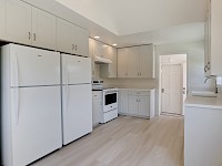 Kitchen features 2 refrigerators