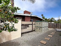 West side yard with storage unit