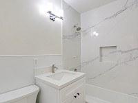 Hall bathroom also connects to west bedroom