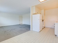 Dining area into kitchen and living room