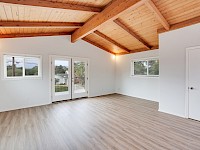 Upstairs living room and access to deck