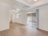 Living room and sliding door to side patio