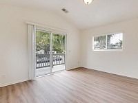 Upstairs south bedroom with balcony