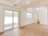 Living room and slider to side yard