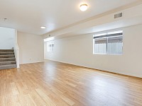 Living room (showing stairs to upper level)