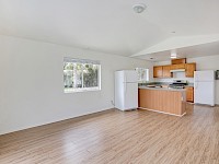 Living room leading to kitchen
