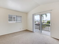 Upstairs north bedroom with balcony