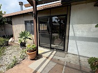Enterance to exterior rec room off back patio